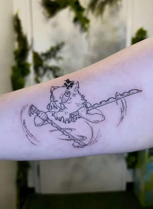 Linework tattoo of Inosuke from Demon Slayer in his boar mask swinging two serrated swords on an inner upper arm